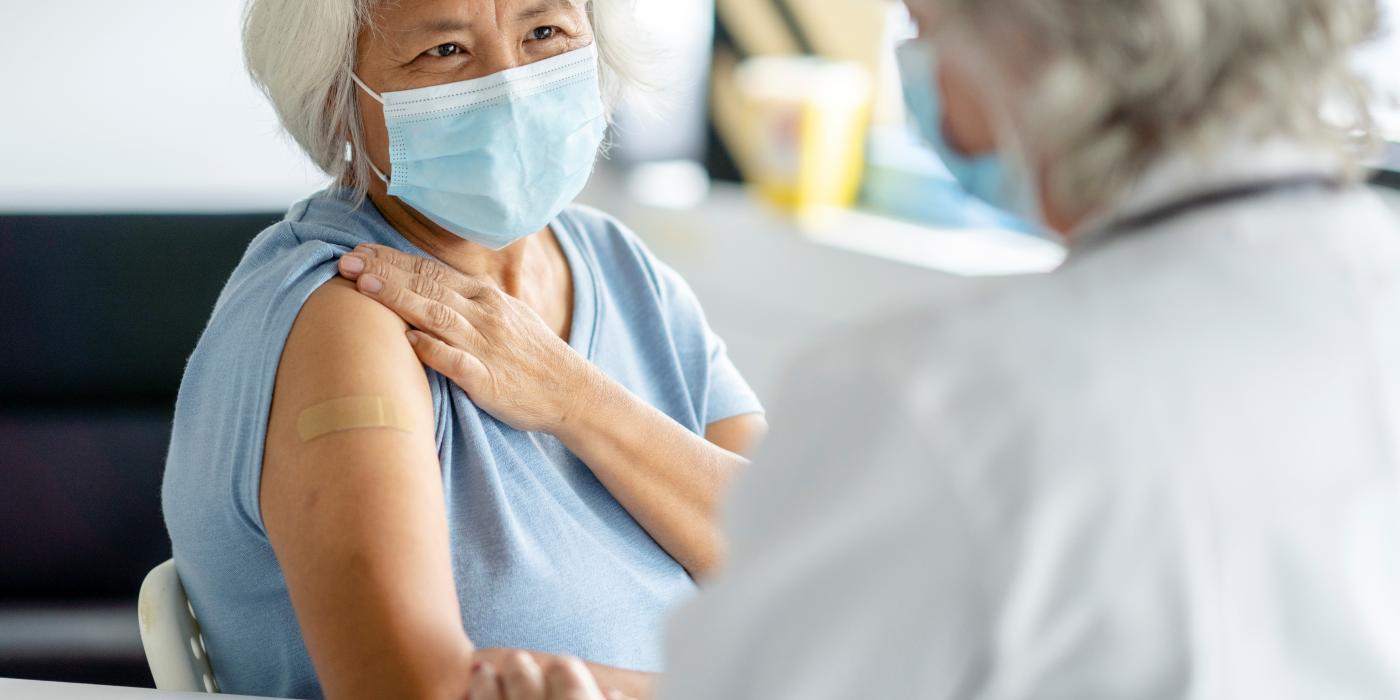 Senior patient receiving her vaccine