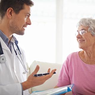 Doctor talking to female patient.