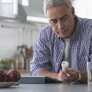 Man holding medication 