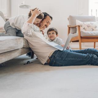 Father trying to work from home with two sons